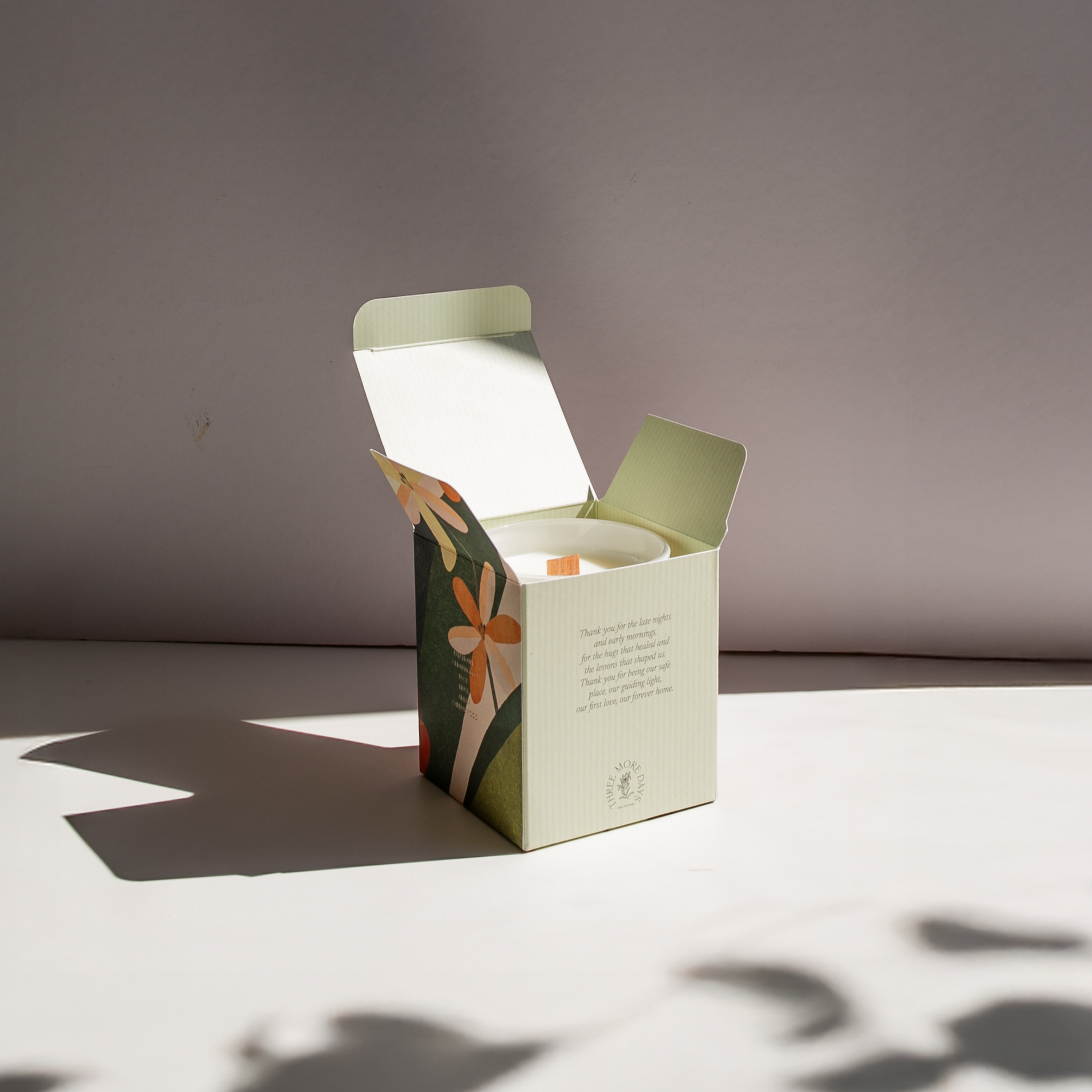 open box of a candle jar
