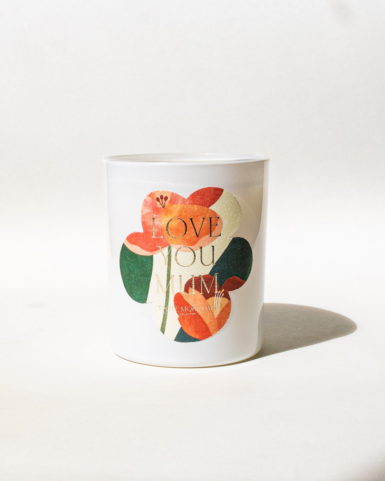 White mug with floral design and 'Love You Mum' text on a white background