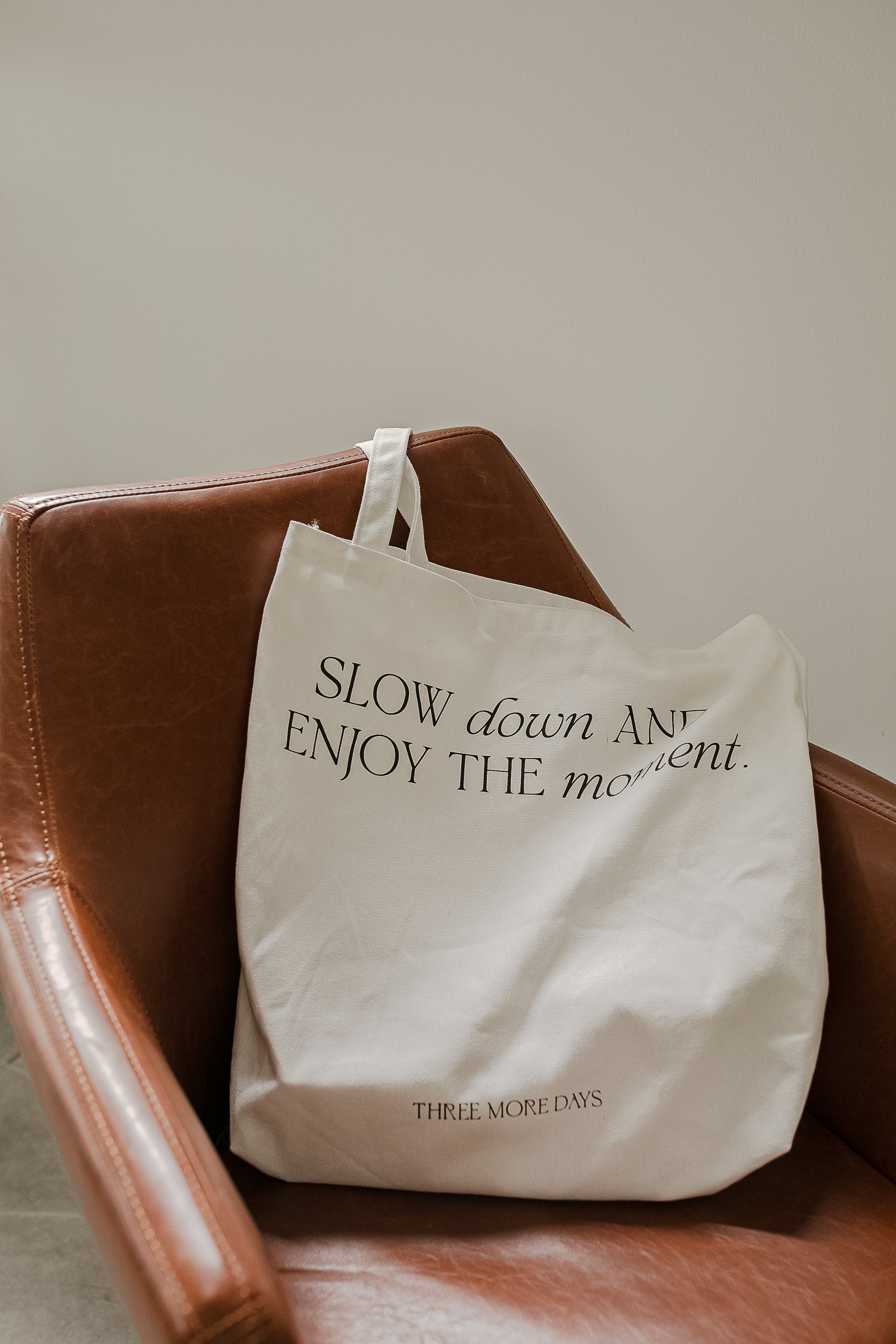 tote bag with black text print