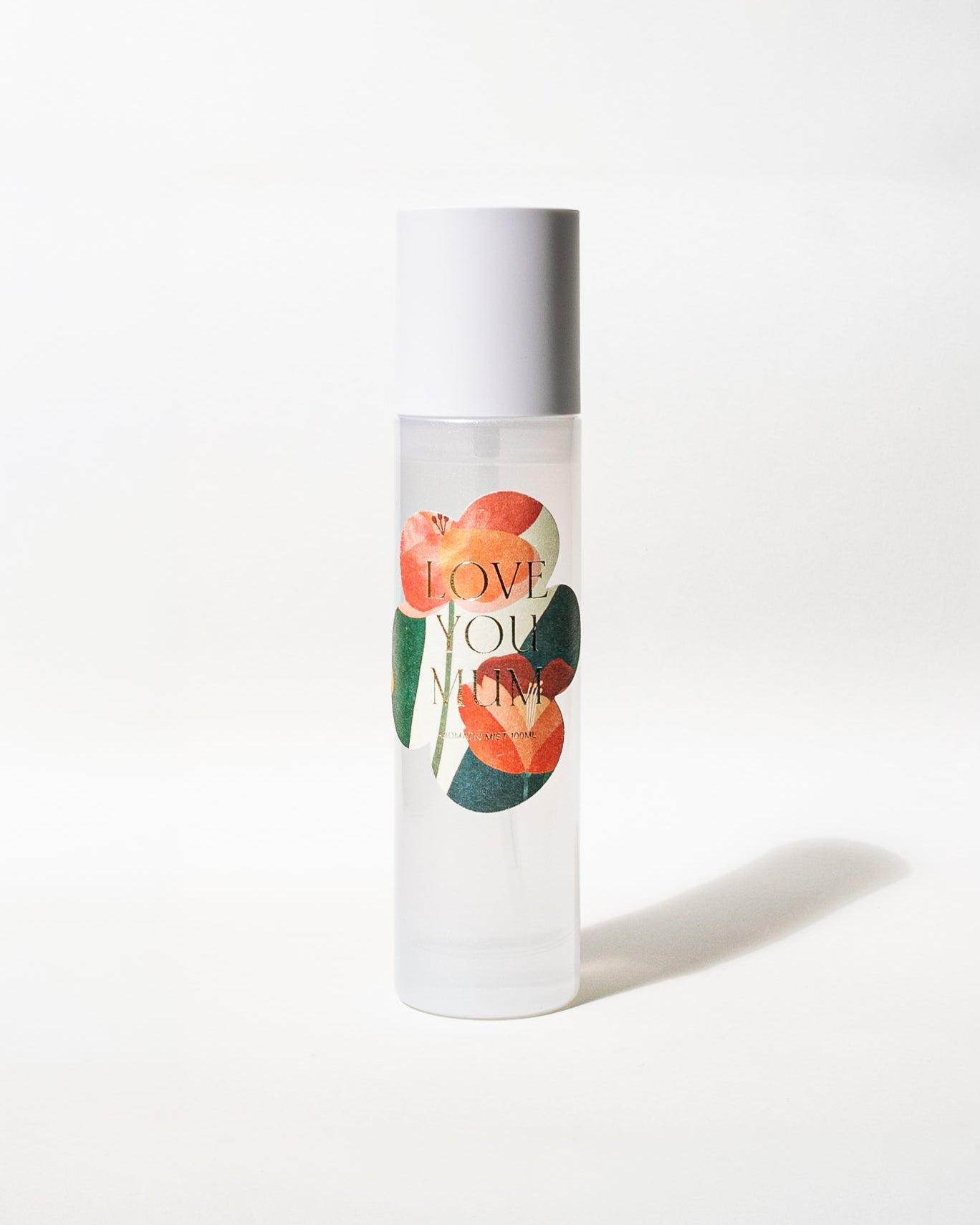 Skincare bottle with floral design on a white background