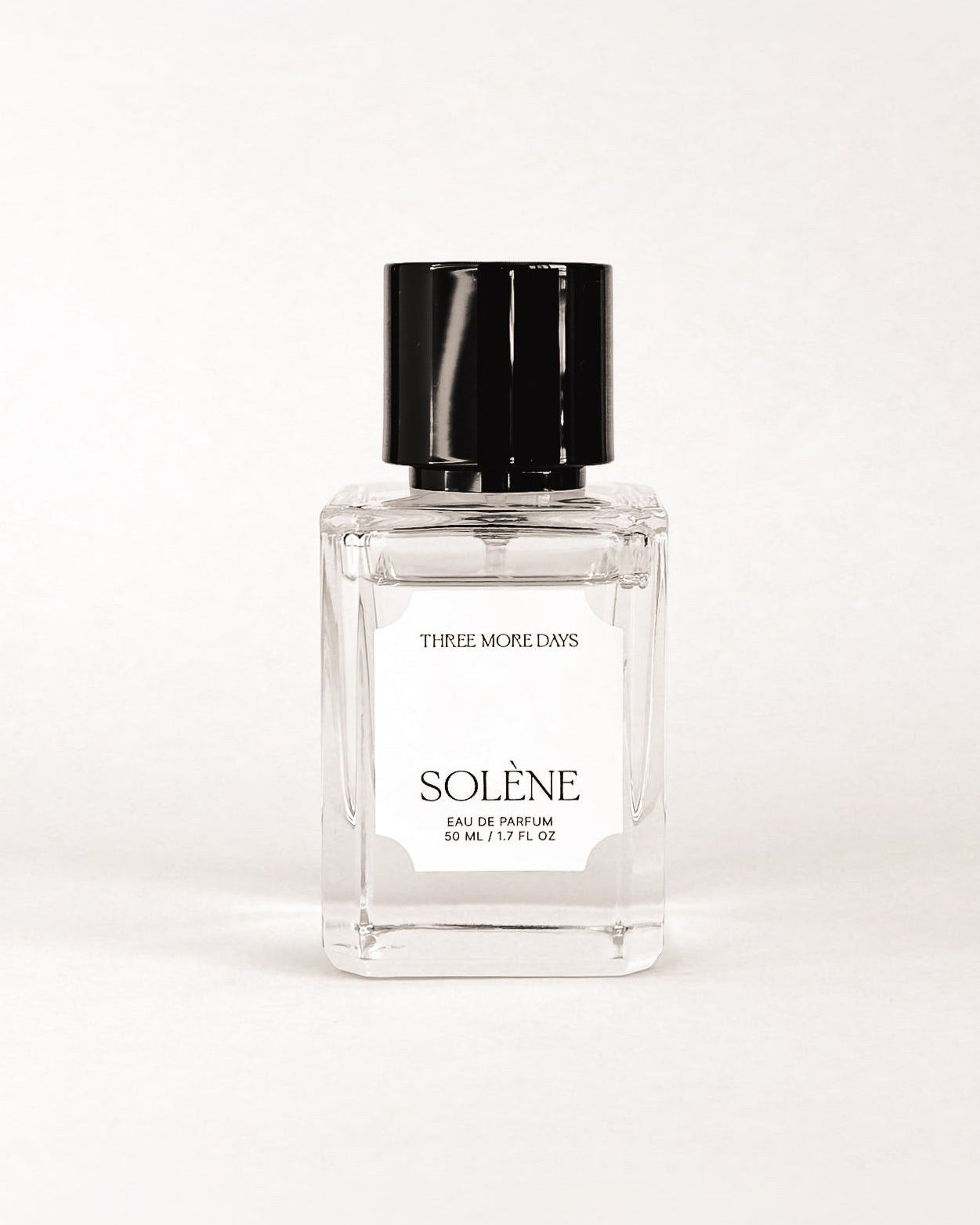 Small perfume bottle labeled 'Soleine' on a white background