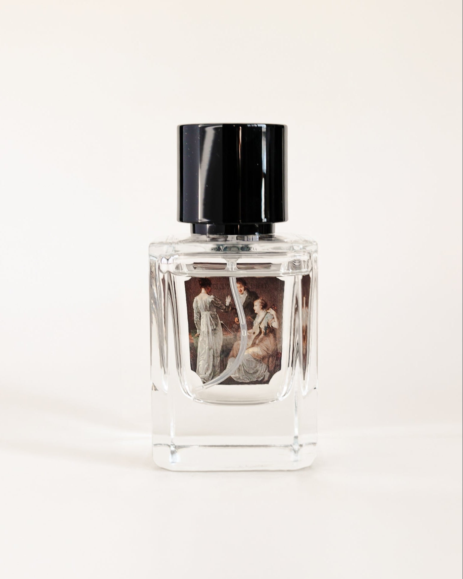 Small bottle with a black cap on a white background