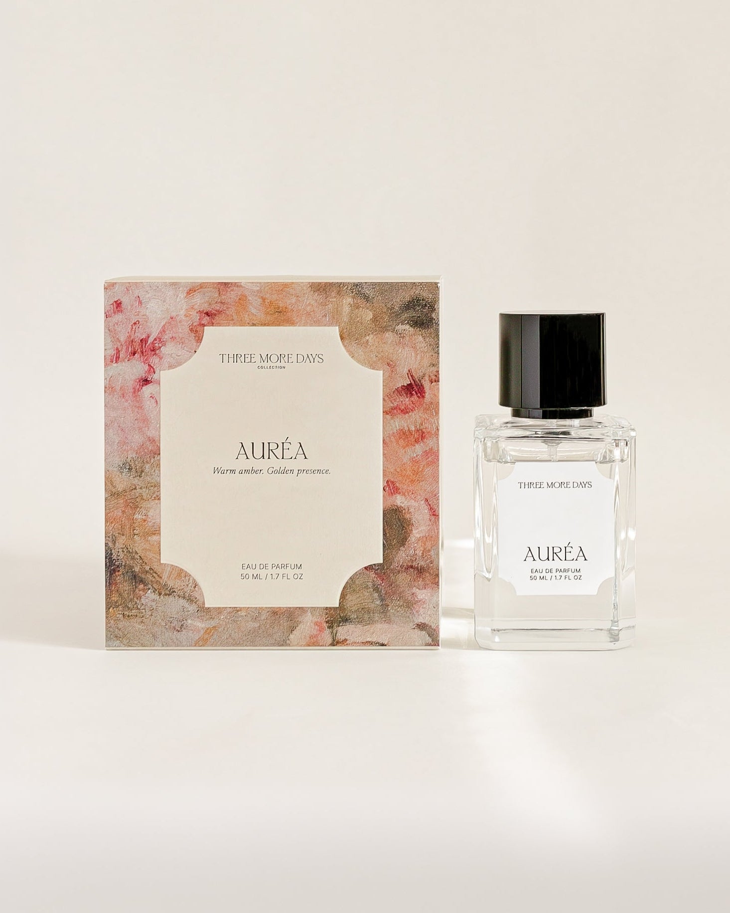 Auréa perfume bottle and packaging on a light beige background